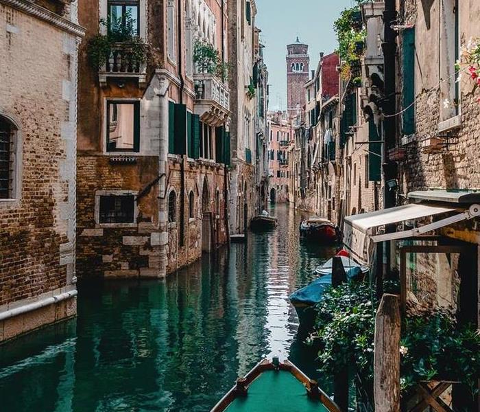 homes on a water canal in Italy