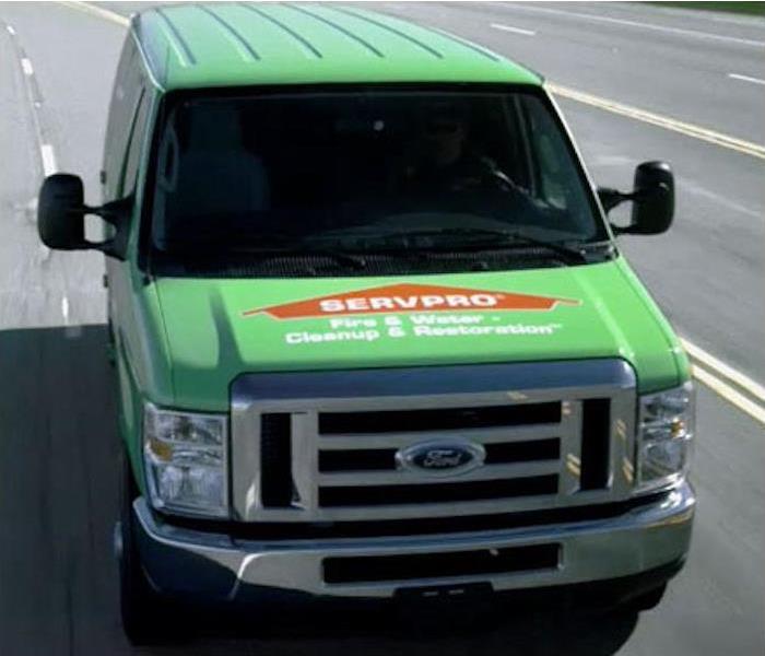 SERVPRO green truck driving down the highway